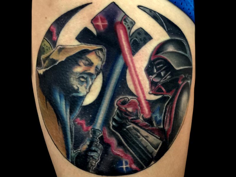 A tattoo depicting a duel between two characters with glowing swords inside a crescent moon shape, featuring vivid colors and detailed shading. If you're looking for exceptional artistry like this, check out tattoos in St. Louis for top-notch designs and skilled artists.